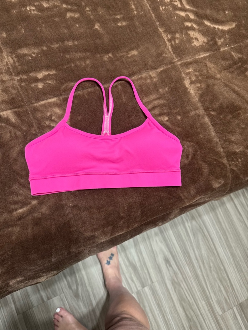 Woman’s size 6 Lululemon bright pink racerback sports bra